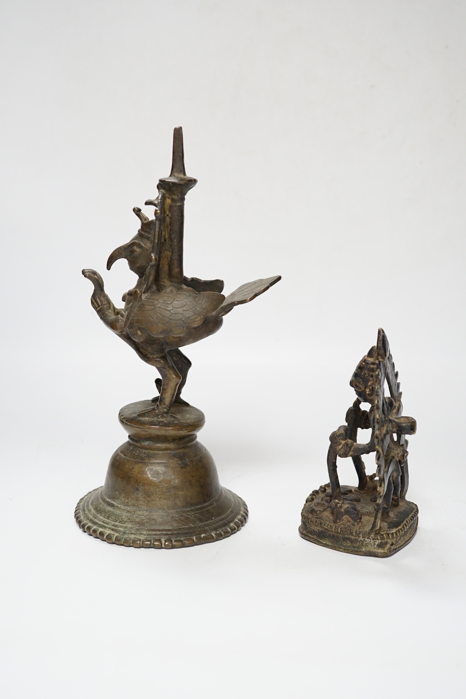 An 18th century Indian bronze figure of Garuda and an 18th century Indian Bronze statue of Shiva Yogi, largest 23cm high